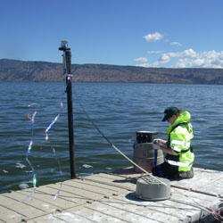 Sampling water in Klamath Lake