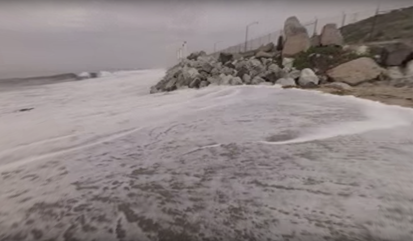 360 degree video captured this photograph during the king high tide at Manhattan Beach, Los Angeles.