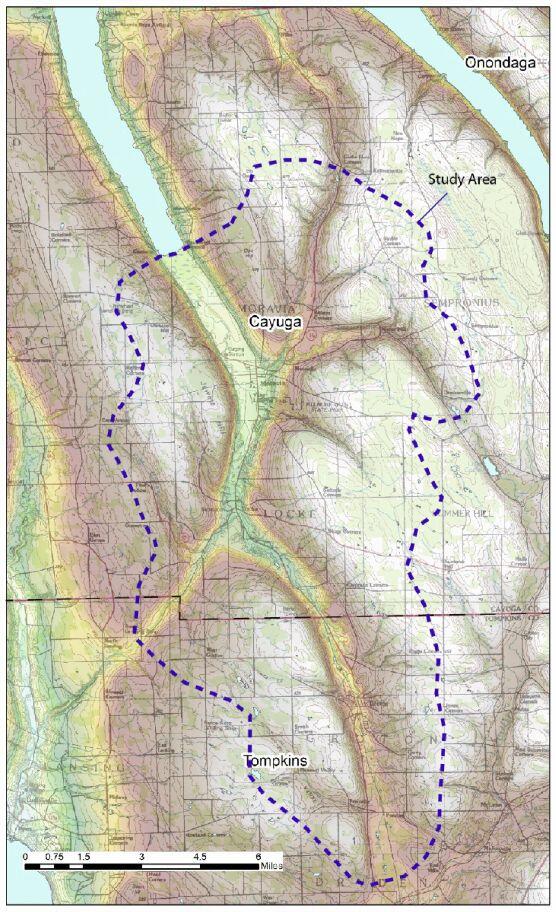 colored map with purple dashed outline of study area