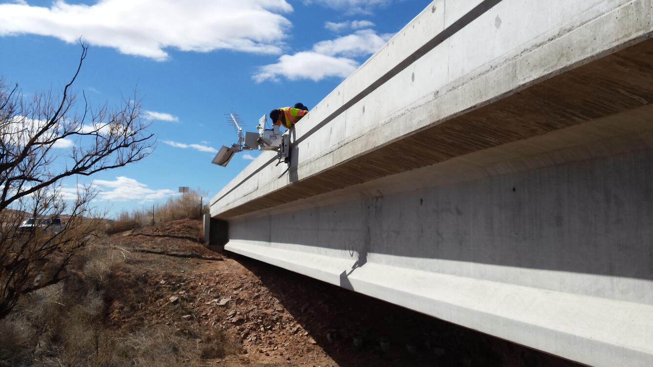 Photograph showing installation of a rapid deployment gage at Leguna Creek, AZ.