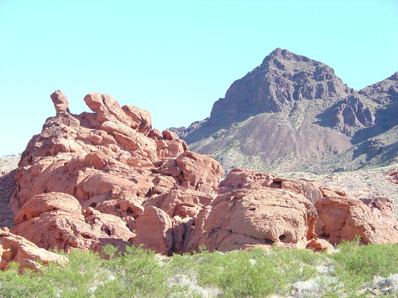 This is a photo of outcrops of Aztec Sandstone near the Redstone picnic and hiking area.