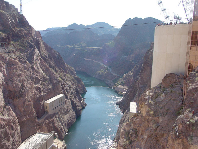 This is a photo of a view looking south from the middle of Hoover Dam along the Colorado River in Black Canyon.