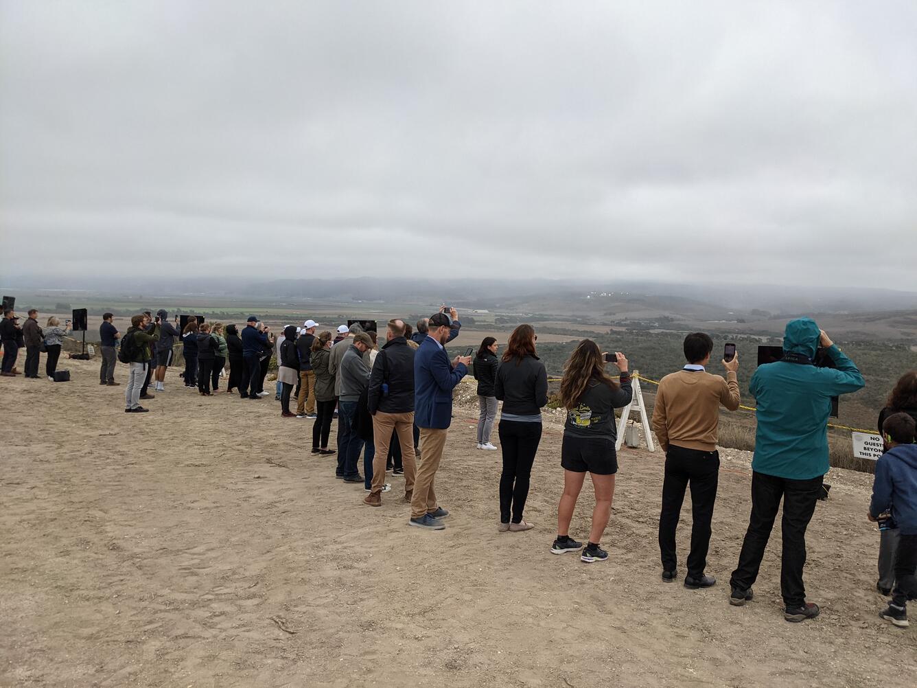 Onlookers observe Landsat 9 launch