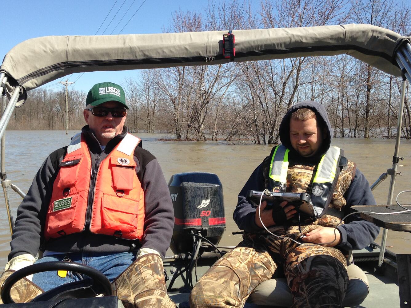 USGS Scientists on a boat on the Green River at Spottsville, KY during high water