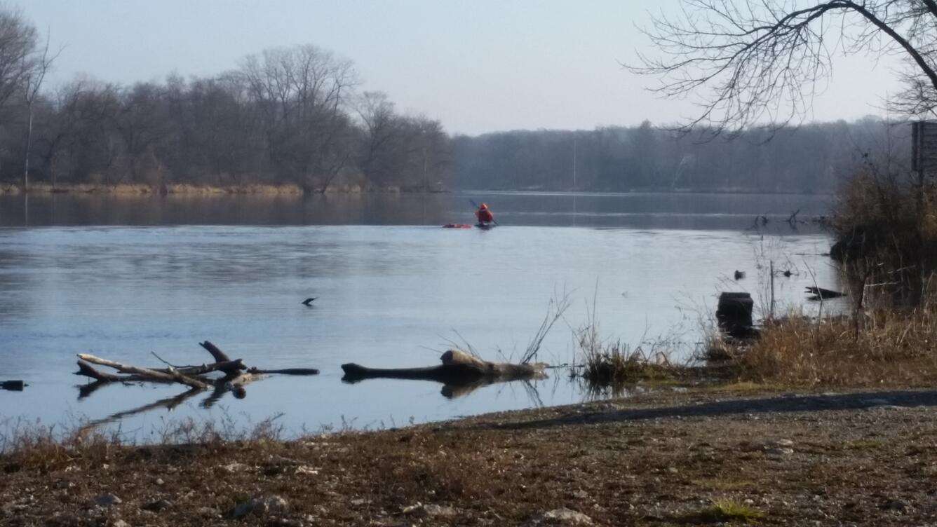 USGS, hydrologic technician collecting water data