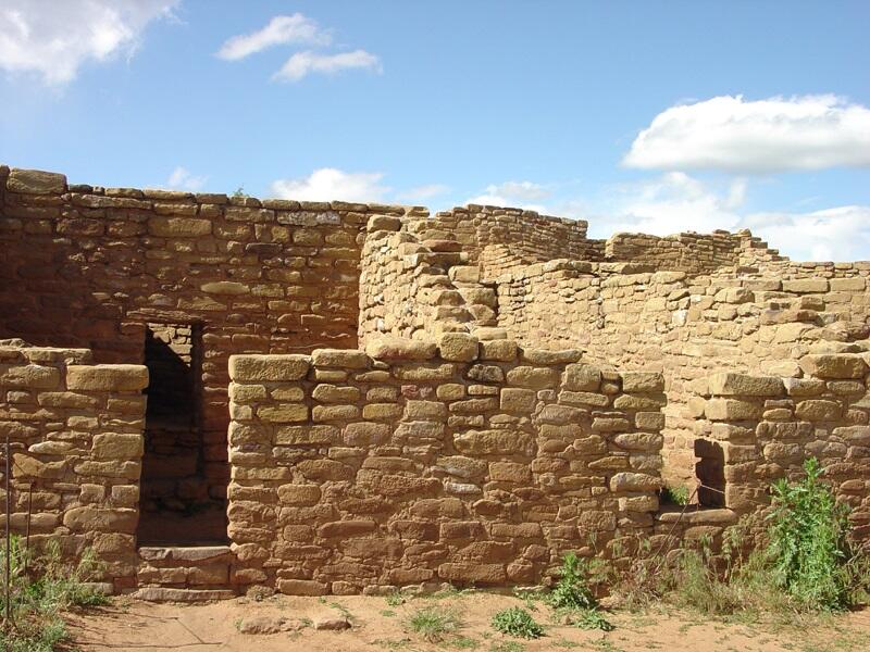 This is a photo of doorways into the dwellings at Far View Ruins.