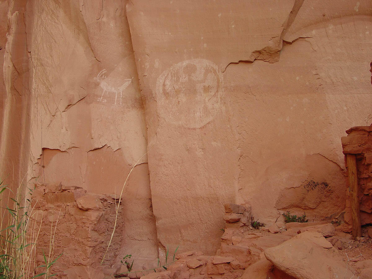 This is a photo of Unusual pictographs on the cliff near Betatakin Ruins.