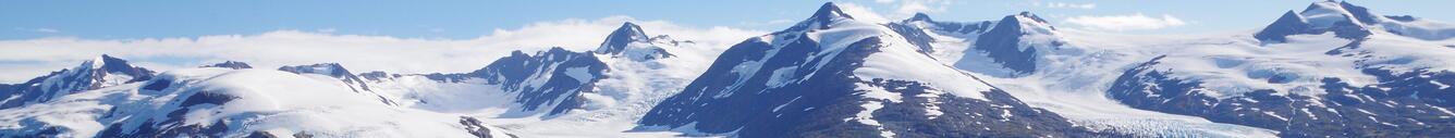 View of snow-covered mountains and the Nellie Juan Glacier
