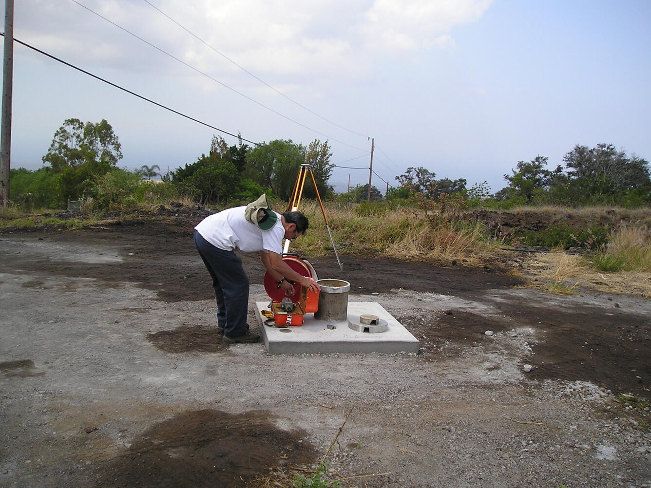 Measuring groundwater level.
