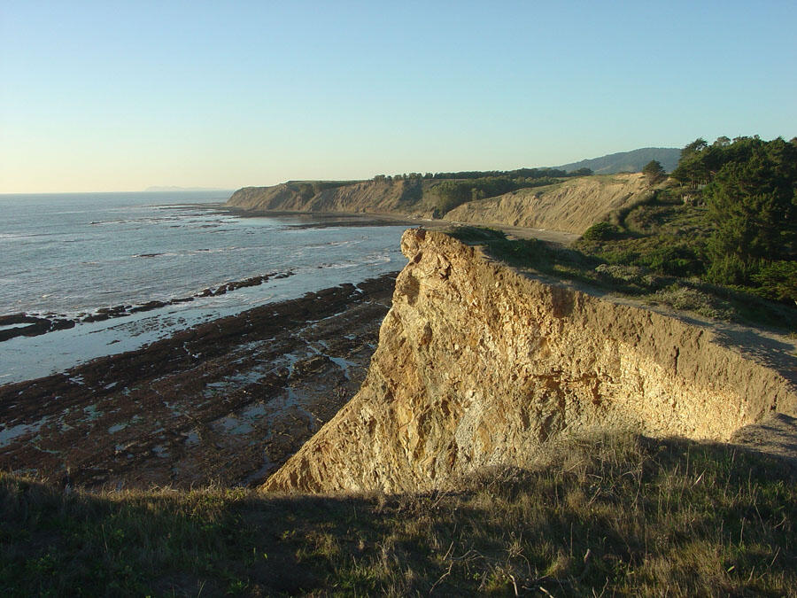 A photo of a sea cliff. 