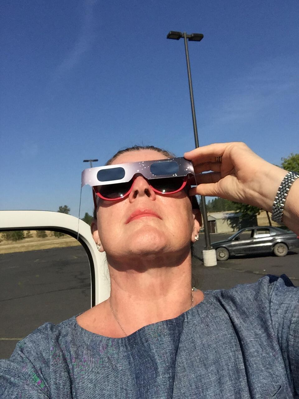 Pam Cossette using Eclipse glasses to view