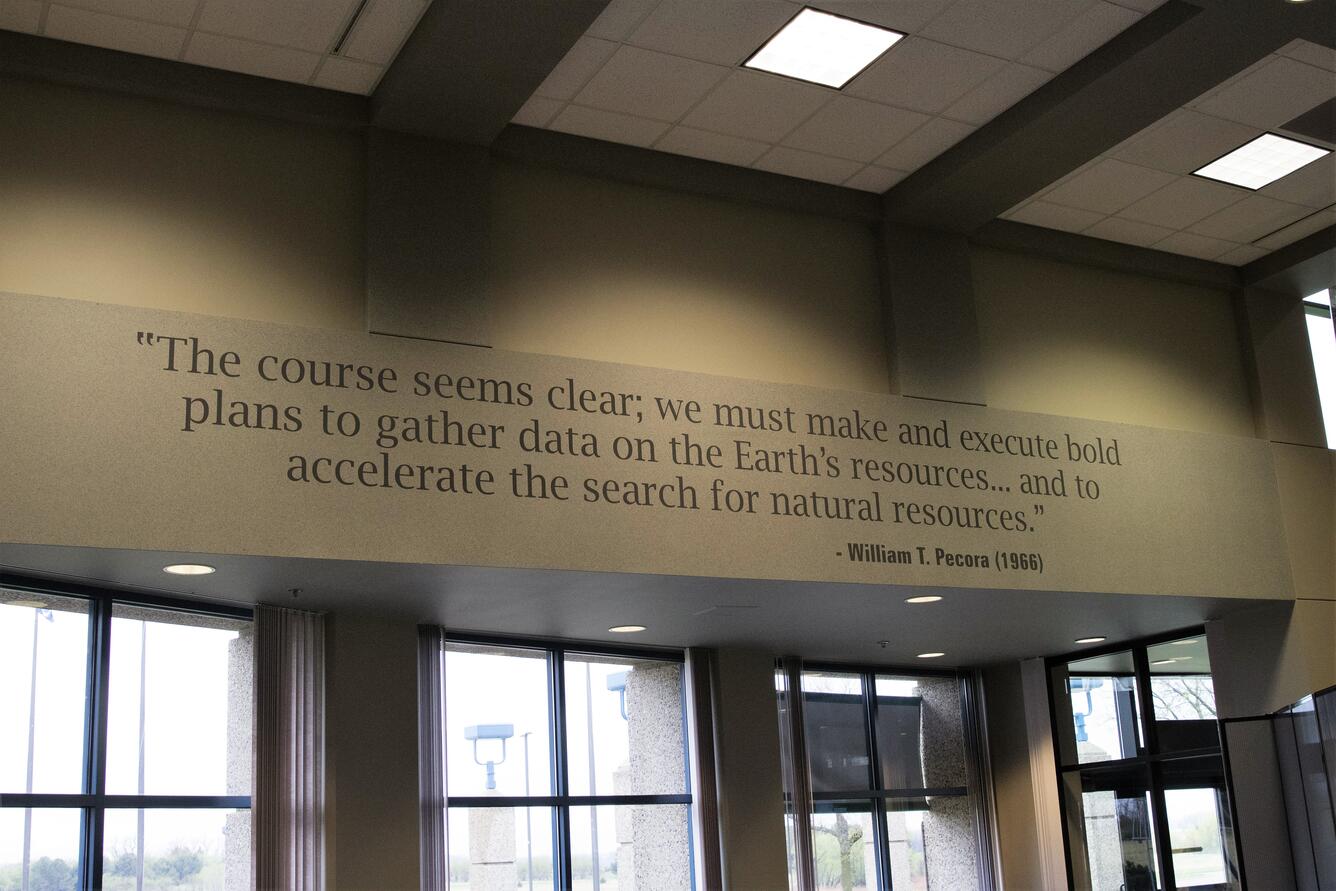 color photograph of William Pecora quote in EROS lobby