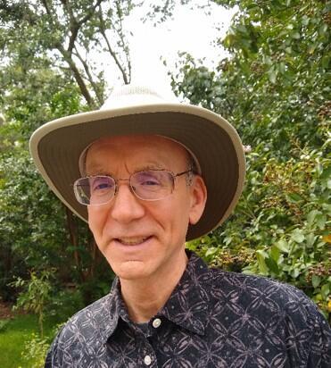 Headshot of John Gordan taken outside