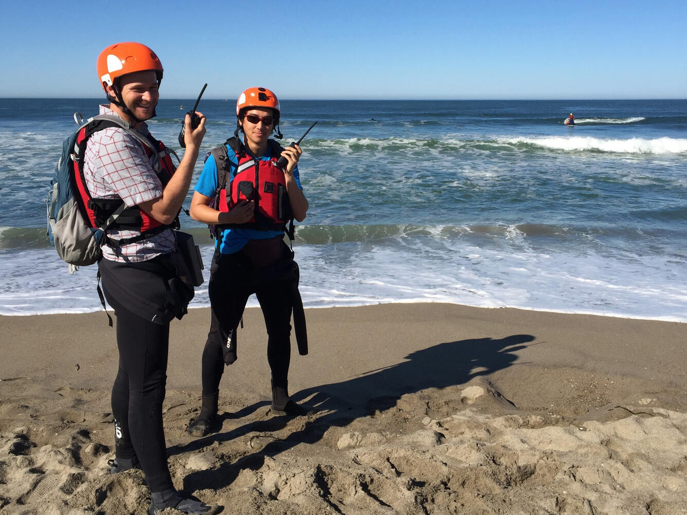 USGS researchers stay in radio contact with a personal watercraft operator offshore