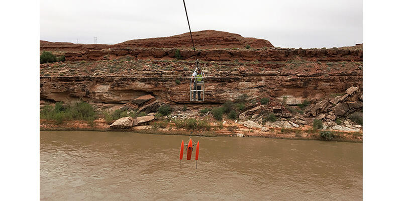 T. Langworthy stands in cable car over San Juan River near Bluff, Utah (circa 2017)
