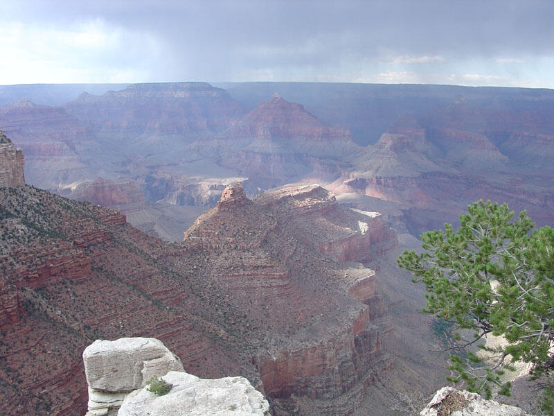 This is a photo of an August afternoon thunderstorm passing over the North Rim of the Grand Canyon.