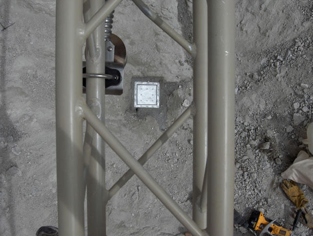 A non-contact stage sensor is suspended approximately 2 meters above the channel bed.