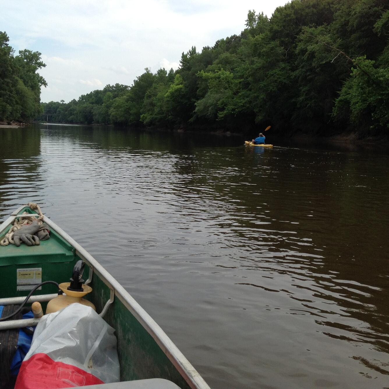 Researchers kayak along the Tar River looking for sites of paleoliquefaction