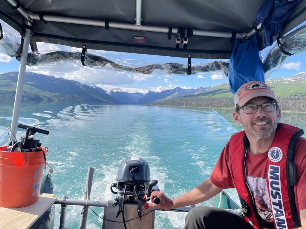 USGS geologist operates a research vessel to investigate evidence for earthquake shaking