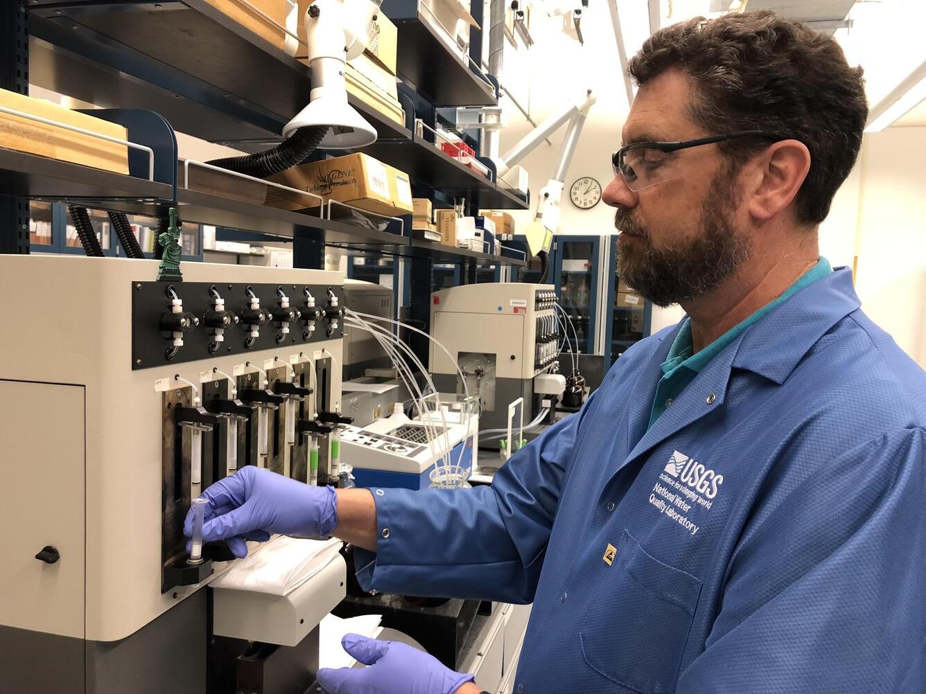Chemist prepares sample for analysis