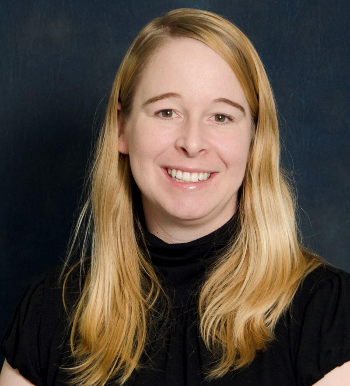 Headshot of Angela Brennan