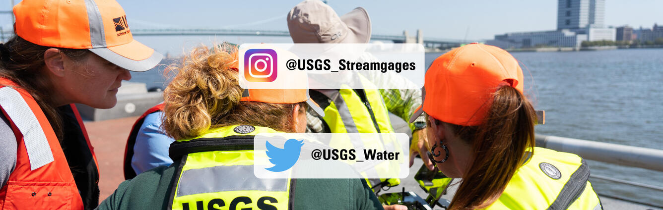 Photo showing USGS scientists discussing data shown on a tablet. USGS WMA Twitter and Instagram accounts and logos also shown.