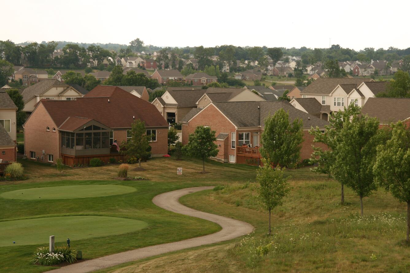 Large suburban neighborhood adjoins a golf course. 