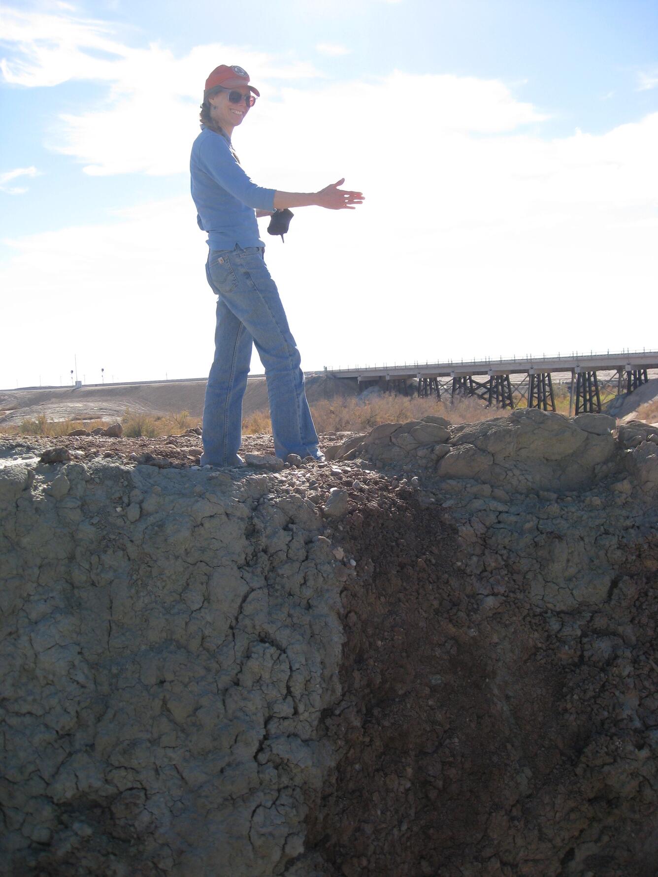 Vicki Langenheim standing at San Andreas Fault