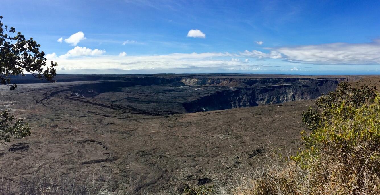 View of the 2018 Kīlauea caldera collapse structures from Kīlauea Overlook within Hawai‘i Volcanoes National Park. USGS photo by