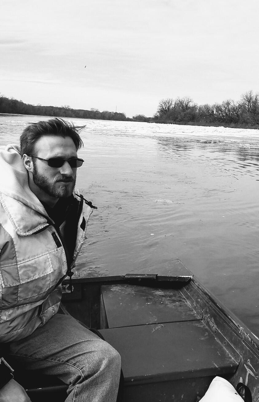 Headshot of Zachary T Holcomb