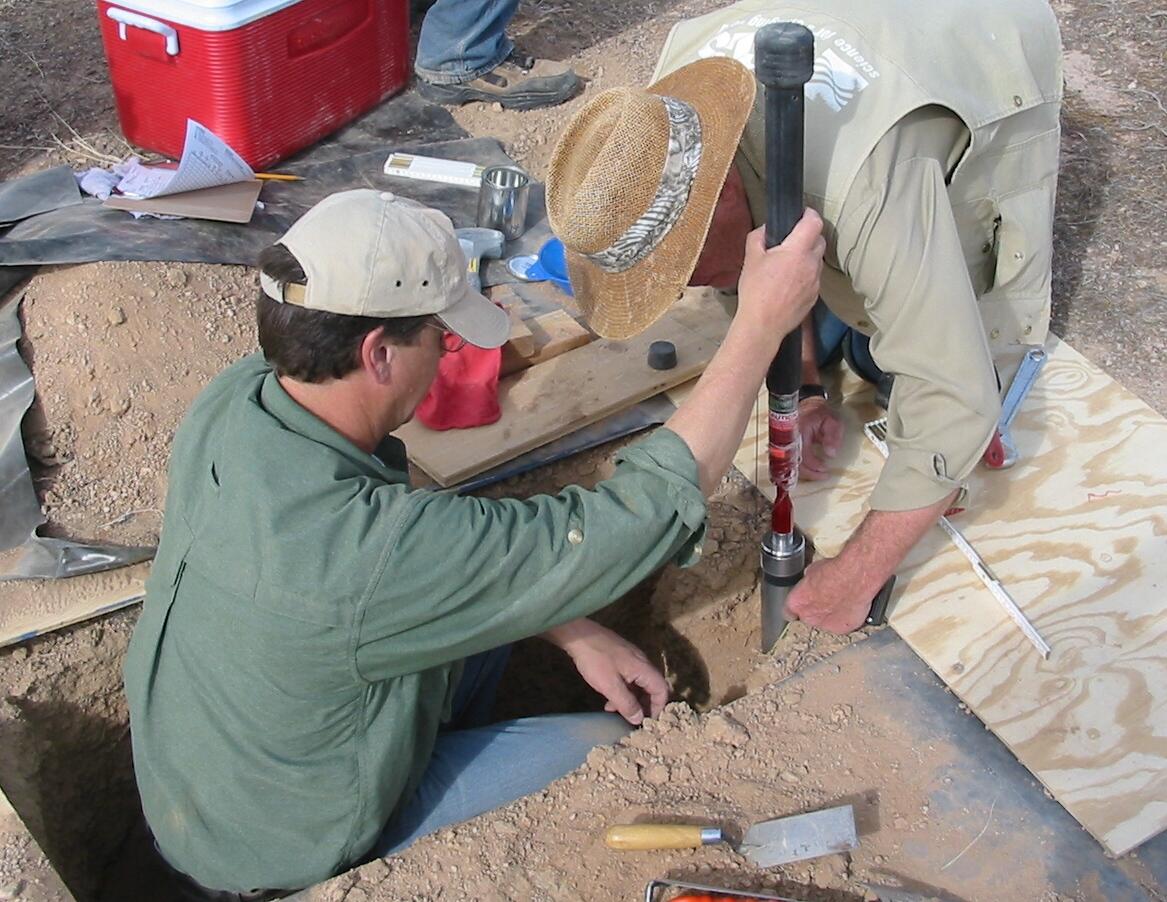 U.S. Geological Survey (USGS) scientists collecting soil-pit samples for a collaborative study with the U.S. Army near Yuma, AZ