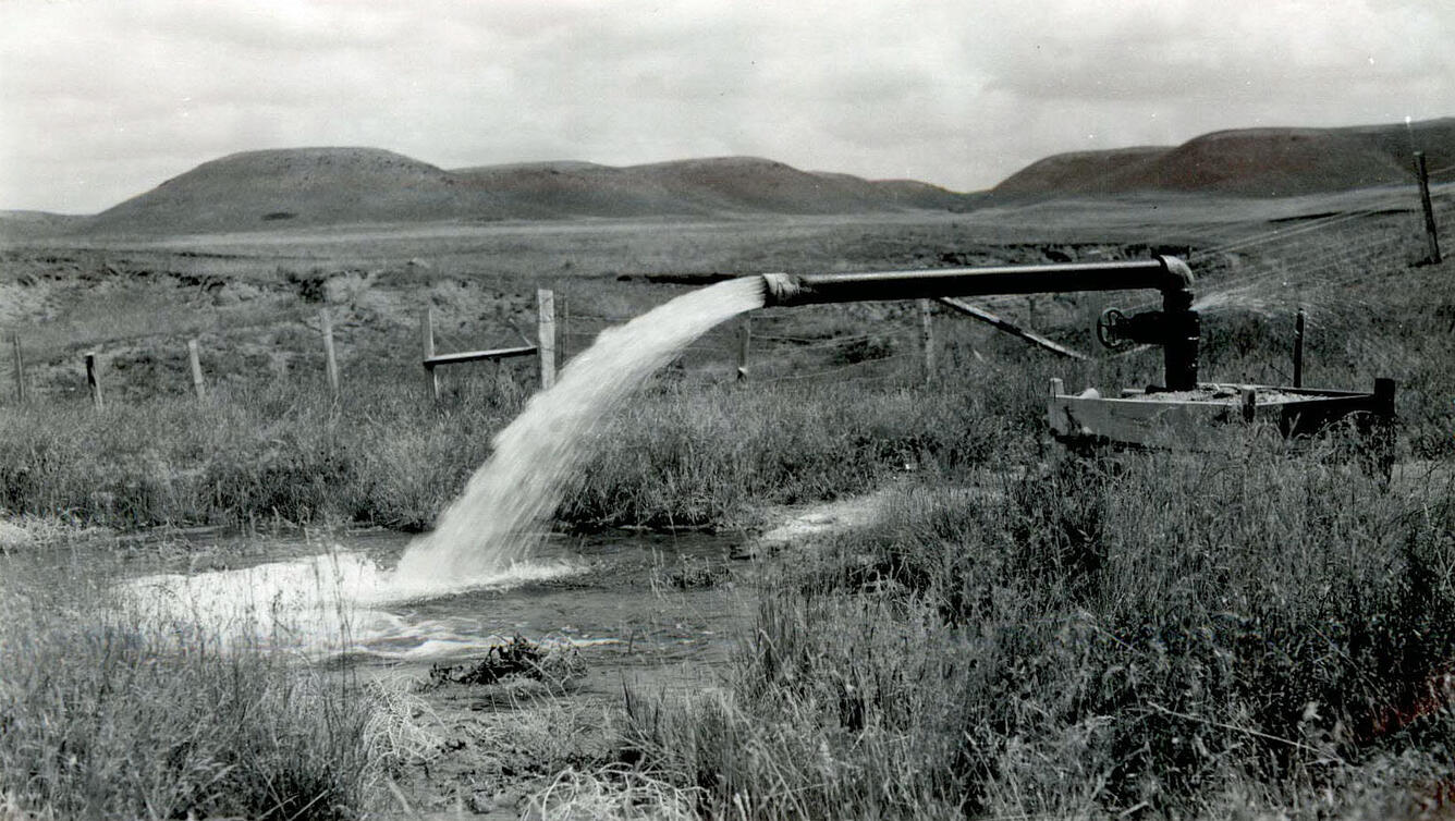 Artesian well used for irrigation, Rapid City, South Dakota (January 1956).