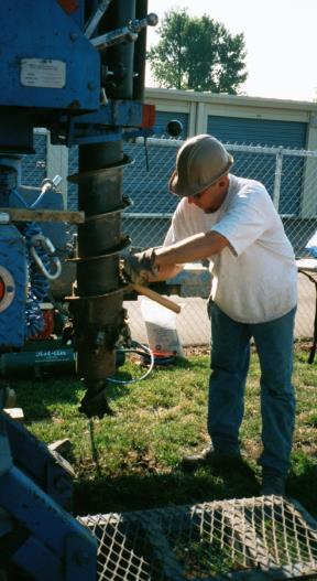 Brian Mailot operating a drill rig