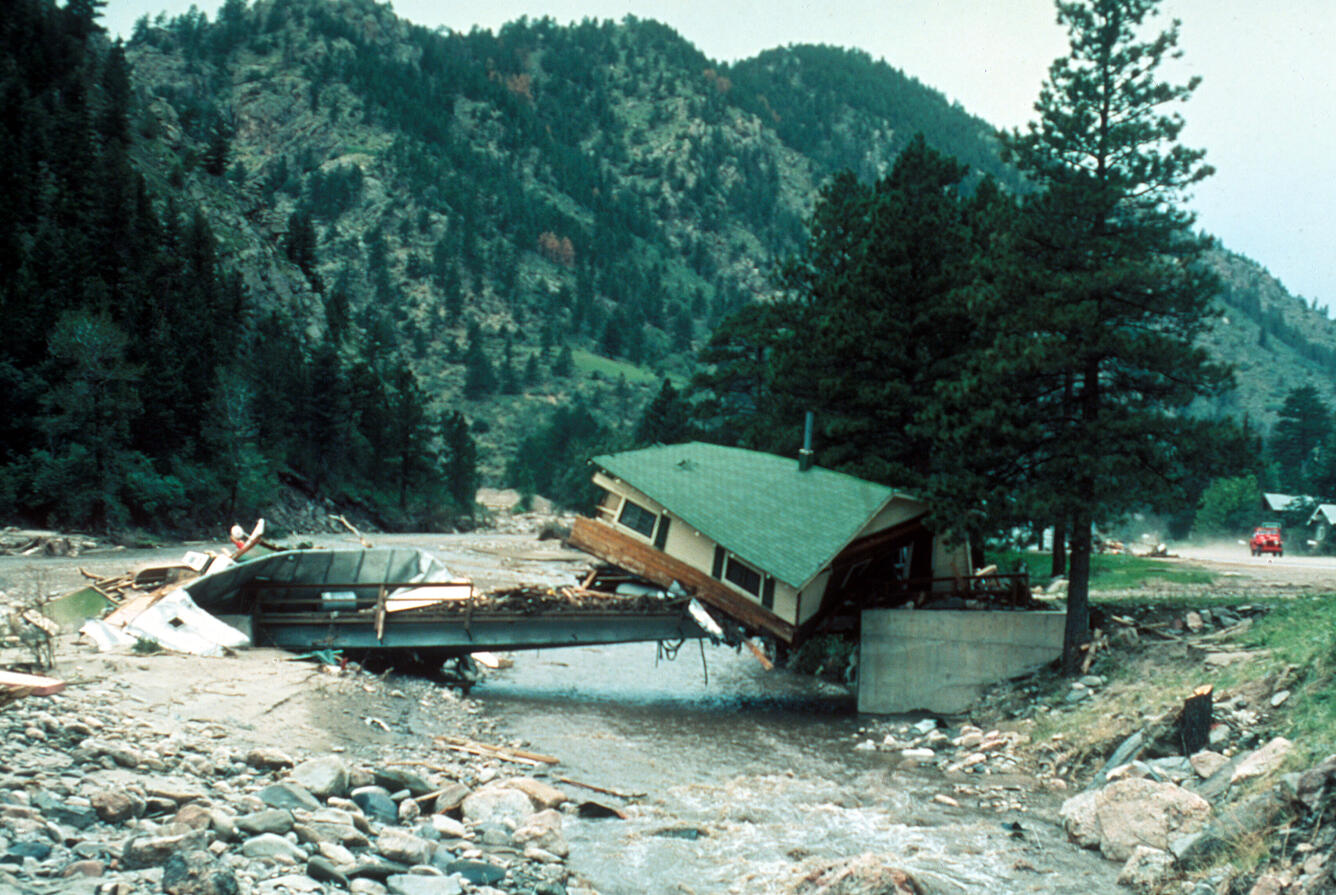 Big Thompson Canyon Flood, Colorado. Cabin lodged on a private bridge just below Drake, looking upstream