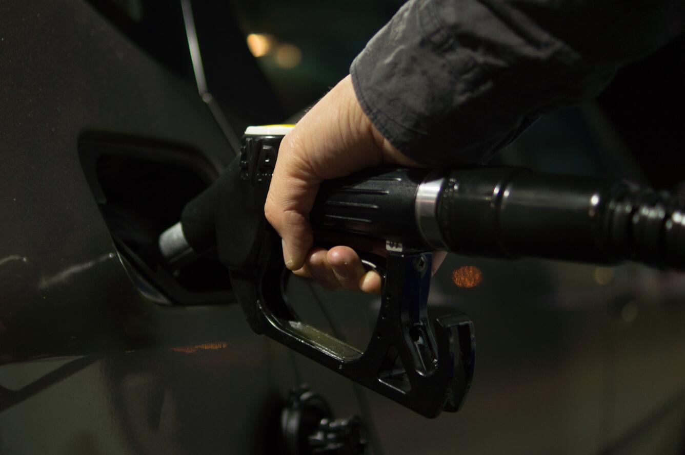 Pumping gasoline into a vehicle