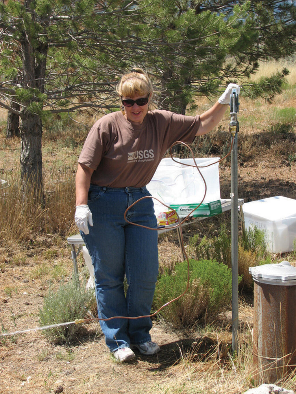 USGS employee sampling a groundwater well 2