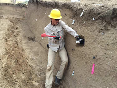 USGS scientist, Ryan Gold, collecting a luminscence sample at the Corner Canyon trench site.