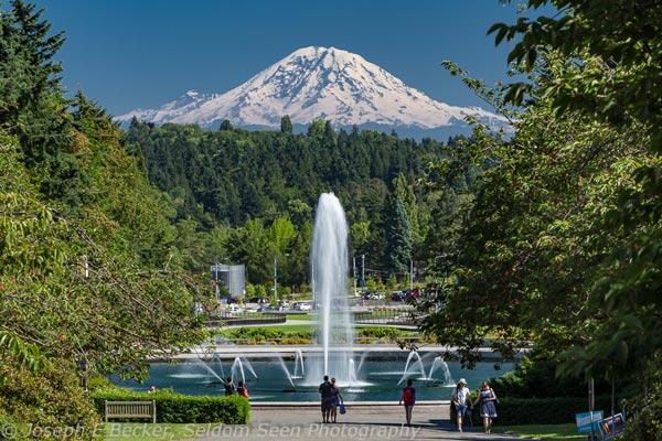 large water fountain with mountain in the background