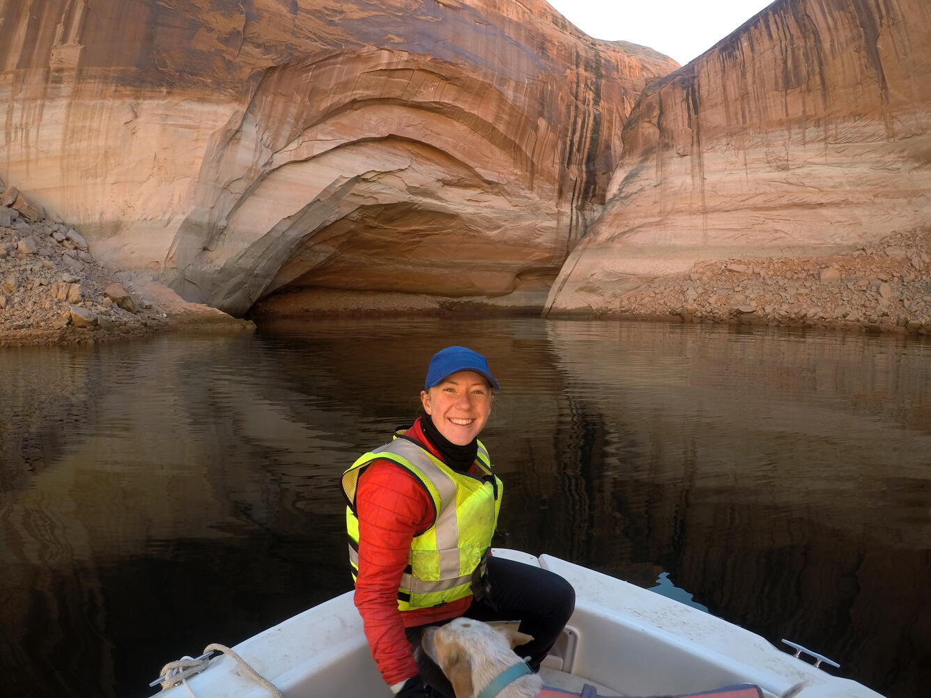 Hydrologist Erin Coenen on boat on water in canyon