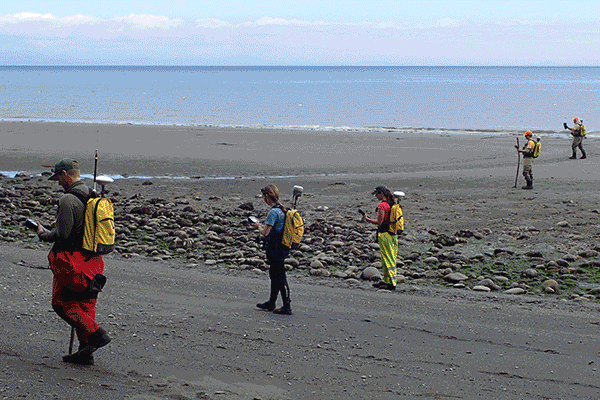 Five photos rotate through showing various activities and locations, some with people and some with biota.