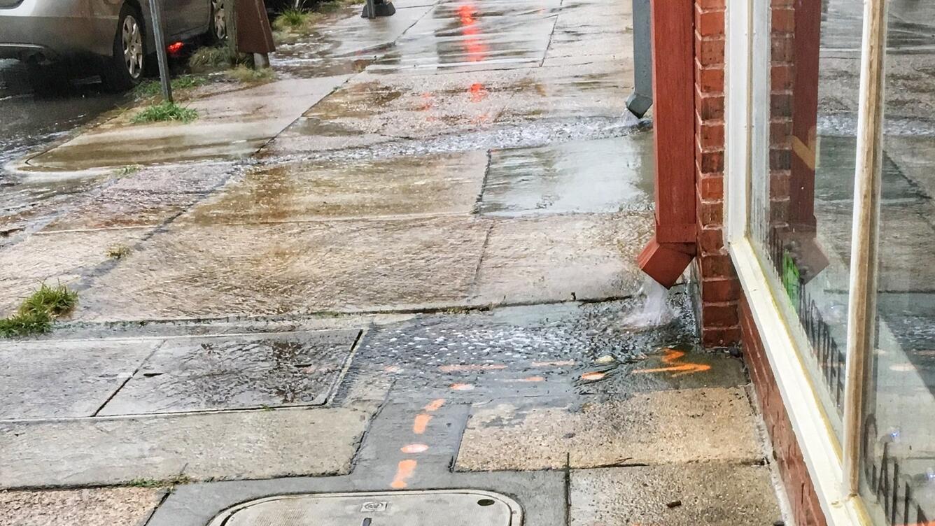 Photo of runoff from rooftops carries pollutants to streams and rivers