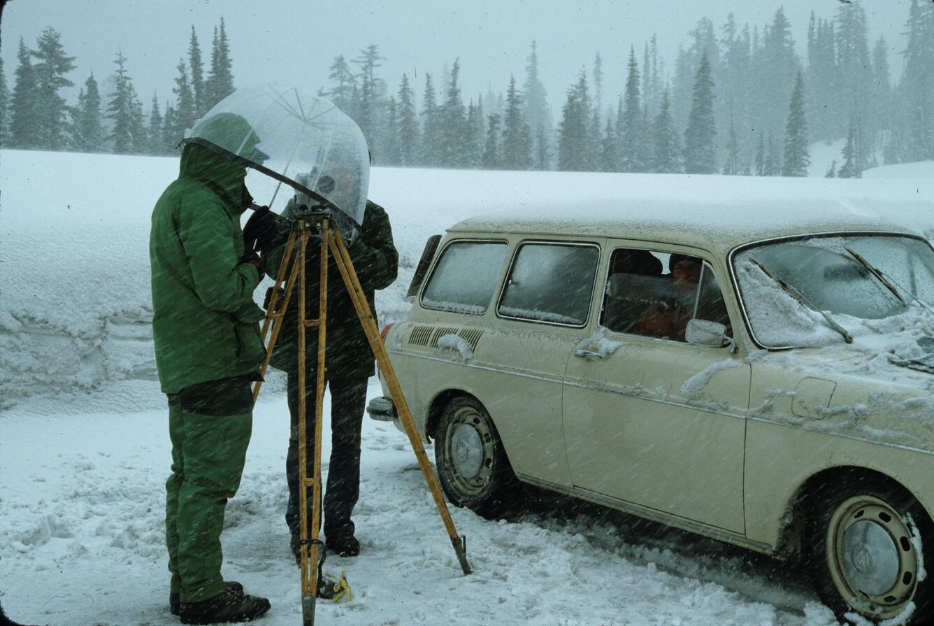 Color photograph of scientists measuring tilt