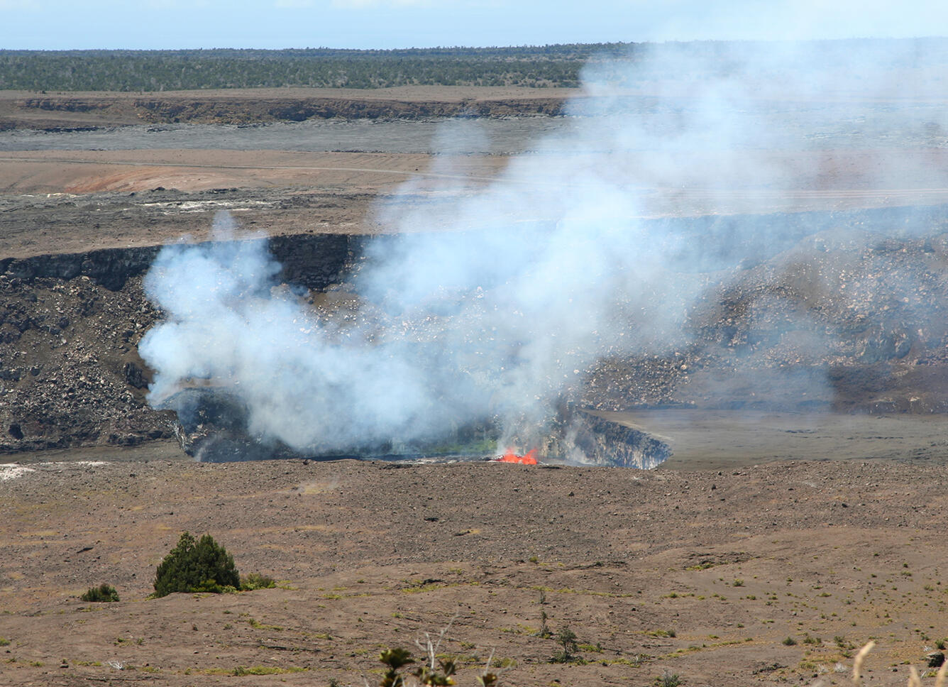 Spattering lava within Kīlauea Volcano's summit vent