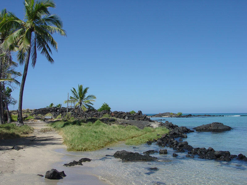 A small native Hawaiian heiau (religious site) and stone walls at Kaloko Honokohau National Historical Park. 