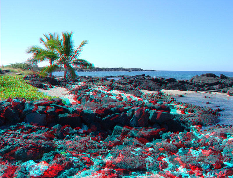 Historic stone walls along the beach-lined cove at Kaloko.