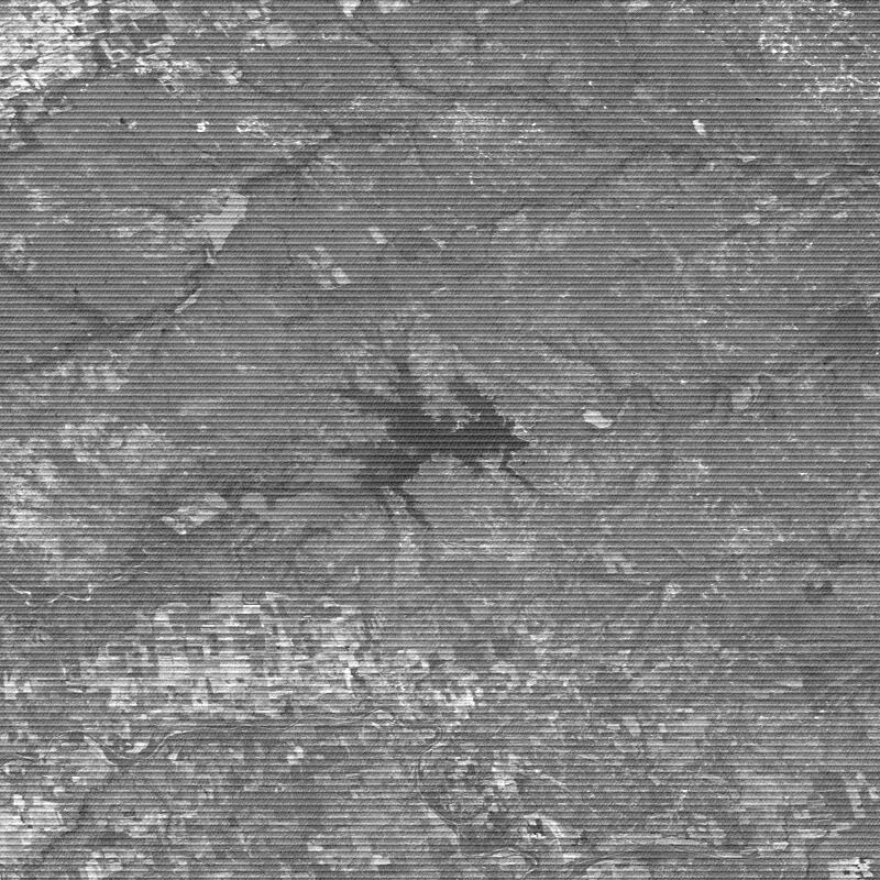 Light and dark stripes on a satellite image of a lake