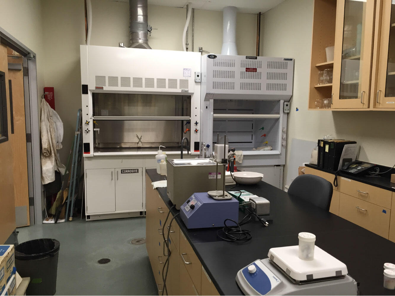 Photo of a laboratory with various equipment and tables to work on.