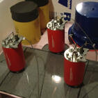 cylindrical metal objects on a table