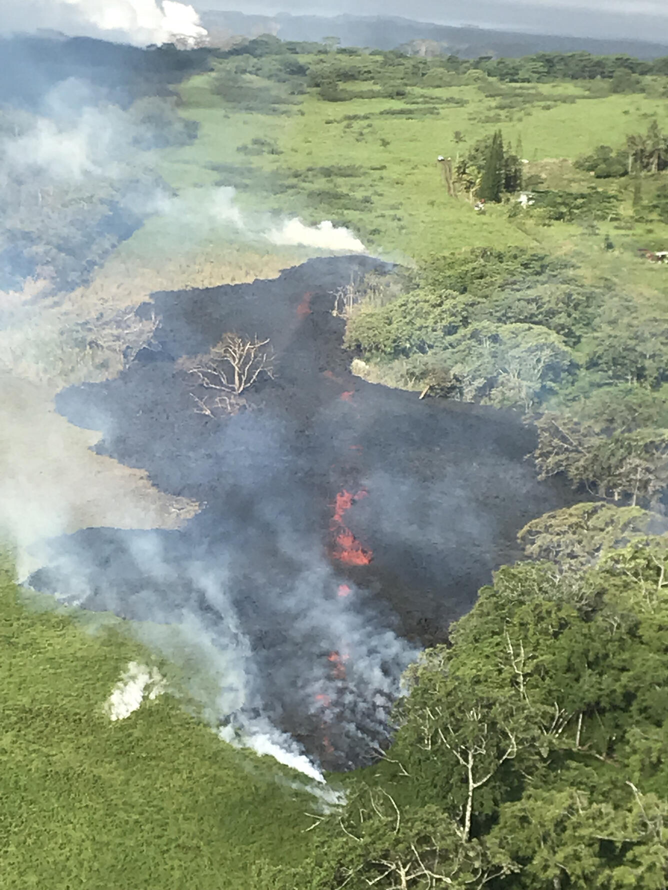 Aerial view of a fissure erupting lava