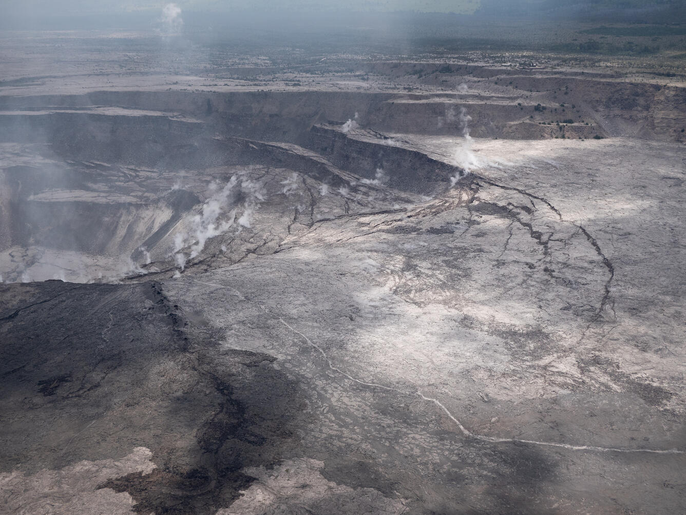 View of a crater with many cracks from slumping